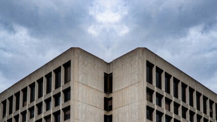 Modern Concrete Building Against Cloudy Sky