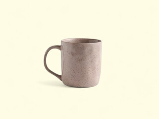 Textured dusty rose speckled ceramic mug with a simple design