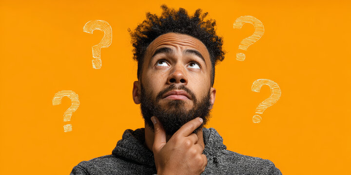 Question confusion thinking doubt curiosity decision choice problem orange background Curious man with beard thinking front of orange background