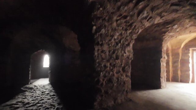 Atmospheric Interior View of the Ancient Subterranean Architecture at the Historic Firoz Shah Palace in Hisar Showcasing Medieval Masonry and Symmetrical Corridors