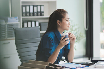 Young Asian businesswoman giving presentation