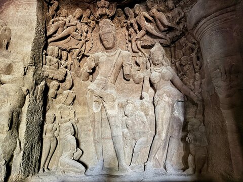 Ancient rock cut cave temple and monumental Shiva sculpture inside Elephanta Caves on Elephanta Island near Mumbai India