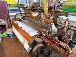 Traditional Himroo textile weaving workshop with vintage looms in Aurangabad Maharashtra India
