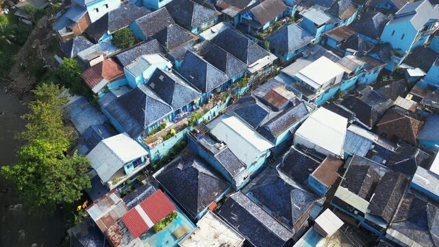Blue Rooftops Kampung Warna Warni Malang Indonesia Drone Forward Pan Up 4K 40FPS