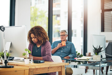 Coworking, typing and people with computer, creative and journalism for article on web and research. Online, reporters and group with tech for story, team and collaboration for project in newsroom