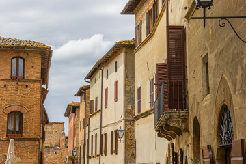 Old houses in the historic center of Tuscan city Pienza, Italy