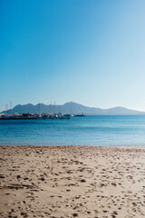 Fototapeta premium Quiet sandy beach and calm bay in Port de Pollenca