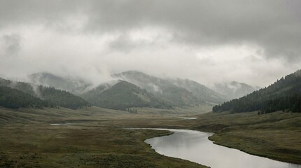 A serene landscape of a winding river flowing through a valley surrounded by mountains under a cloudy sky