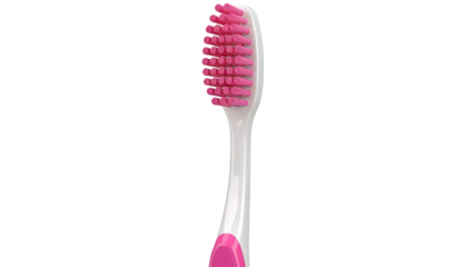 Close-up of a pink and white toothbrush head