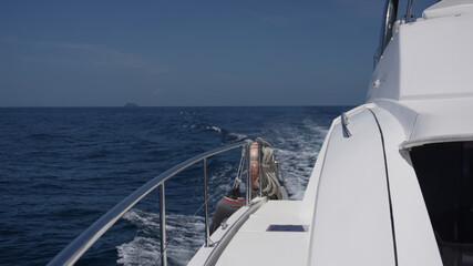 A motor yacht in motion. Yacht parts against the sea, yachting details.