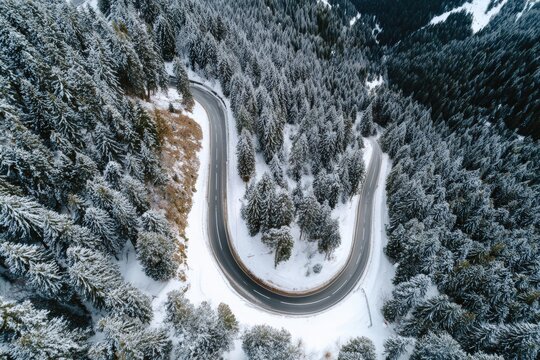 Scenic Mountain Road in Winter: A Serene Journey Through Snowy Landscapes - Powered by Adobe