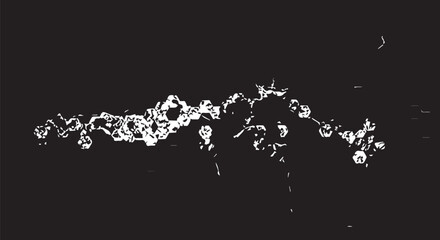 Fluid water splash trail in midair against dark background.