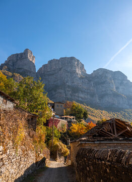 View of the village Mikro Papingo and Astraka Mountains among the autumn lem in the Epirus mountains in Greece