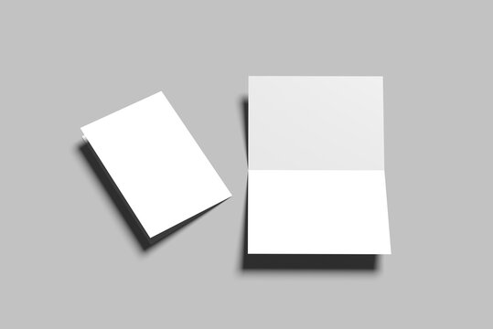 Bi fold vertical - landscape brochure or invitation mock up isolated on gray background.