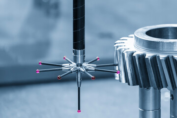 CMM Machine Measuring Metal Gear Parts with Modular Probe in Light Blue Scene