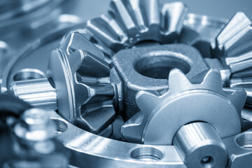 Close Up of Automotive Gear Parts During Assembly Process in Blue Tone Scene