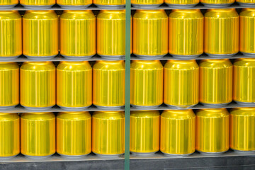 Golden Metal Cans on Pallet with Conveyor Belt in Packaging and Logistics Process