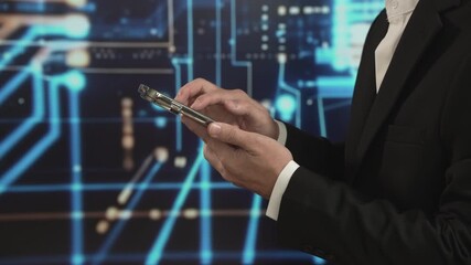 Closeup Asian businessman checking smartphone, wearing formal suit, standing against futuristic digital circuit background, representing mobile, professional workflow, connectivity worldwide