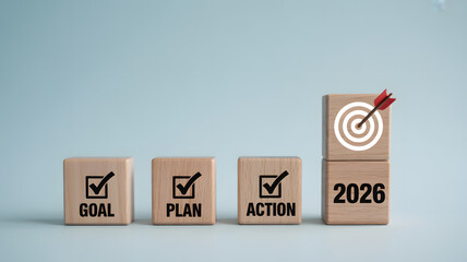A set of wooden blocks representing goal setting and planning for 2026