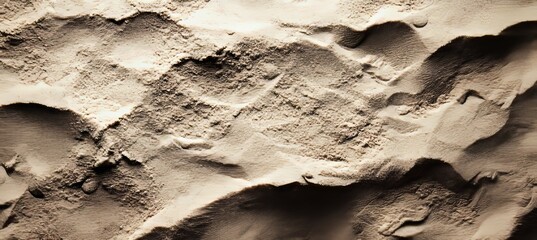 Fototapeta premium Eroded Desert Landscape with Granular Texture and Seamless Surface in Beige and Brown Tones