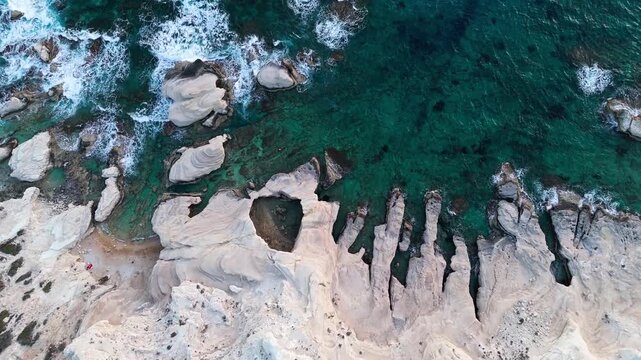 4K Aerial Pull-Away Shot of Dramatic White Cliffs and Turquoise Sea, Paphos, Cyprus
