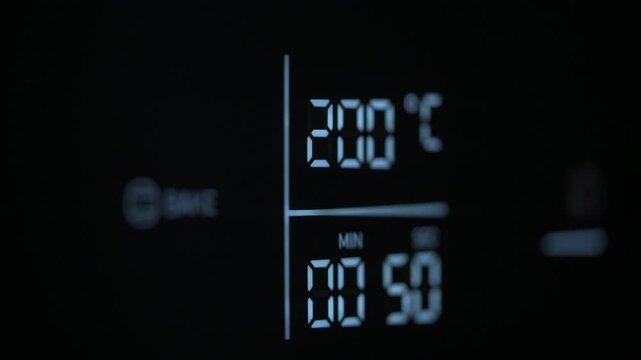 4K horizontal footage of digital display of black air fryer