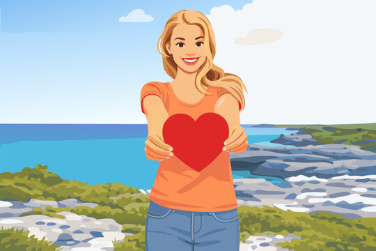 Smiling person holding out a small red heart towards the camera as a gift.