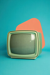 Vintage Retro Television on Blue Background with Geometric Coral Shape, Pop Art Style