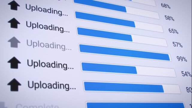 Video animation of the process of uploading multiple files from the Internet on a computer monitor screen. A computer monitor displaying information about the data upload in real time, including perce