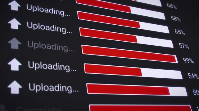 Video animation of the process of uploading multiple files from the Internet on a computer monitor screen. A computer monitor displaying information about the data upload in real time, including perce
