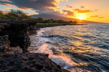 Naklejka premium Idyllic beach with black volcanic sand and rocky cliffs at sunset, waves crashing on shore, lush green trees, and mountain silhouette under colorful sky