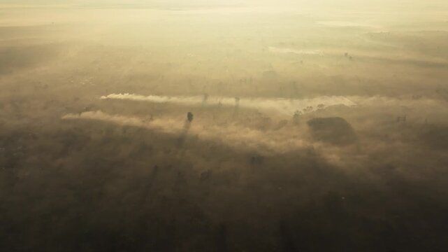 Aerial View Of Epic Dawn Mist over Central Highlands Landscape in Krong Nang, Dak Lak
the dramatic topography of Vietnam's Central Highlands. Watch as the morning sun burns through thick layers of fog