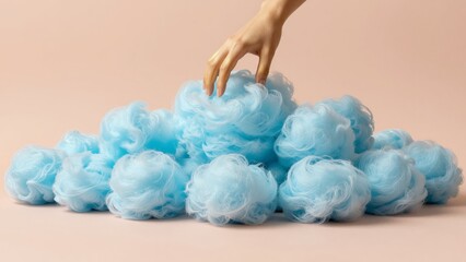 Sky blue cotton candy mountain with a golden human hand reaching from the top, centered against a flat peach sky to provide a vast and whimsical canvas for creative and airy headlines.