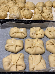 Homemade dough ready for baking on trays