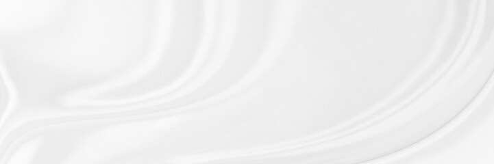 White gray satin texture that is white silver fabric silk panorama background with beautiful soft...