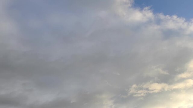 Early twilight with a grayish and slightly orange cloud