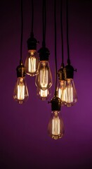 Edison light bulbs hanging dark background