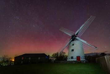 The most amazing aurora over a mill on  Anglesey