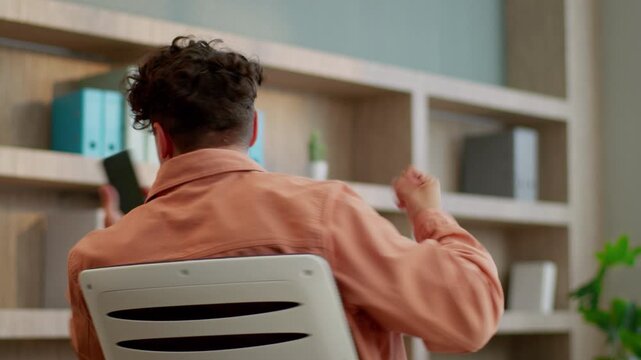 Caucasian business man winning mobile phone in office businessman male guy entrepreneur win with smartphone achieve success betting emotional yelling manager user celebrating winner happy in office