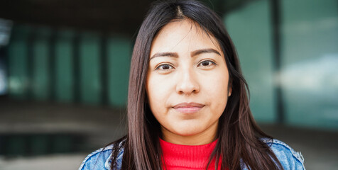 Native american girl looking on camera outdoor - Indigenous young woman portrait - Lifestyle concept - Focus on face © DisobeyArt