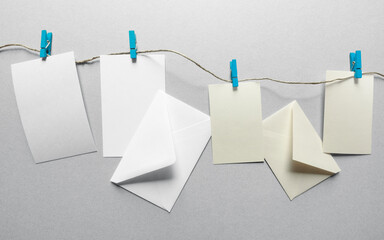 Envelopes and cards hanging, close-up