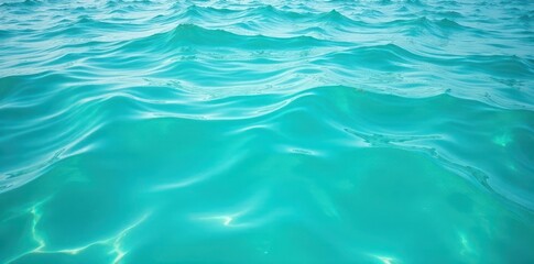 Fototapeta premium Calm turquoise sea water with subtle foamy details, turquoise, water