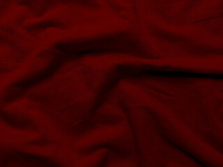 deep burgundy fabric texture elegantly folding in soft light for luxury wallpaper or banner with copy space
