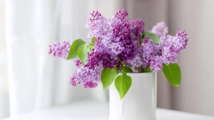 Fototapeta premium Purple lilac bouquet in a white vase on a table by a bright window. Concept Purple Lilacs, White Vase, Window Light, Tabletop Still Life, Floral Arrangement