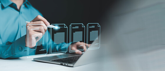 Business professional editing digital documents on laptop with virtual file interface. Online documentation, paperless workflow and modern document management system concept for business technology.