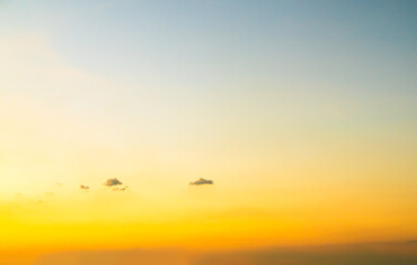 Fototapeta premium Sky sunset evening sunrise cloud weather dramatic landscape goldent and indigo color gradient pastel horizon, twilight yellow golden reflection morning nature environment energy ecosystem change