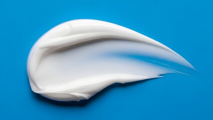 Minimalist White Cream Swirl on Bold Blue Background.