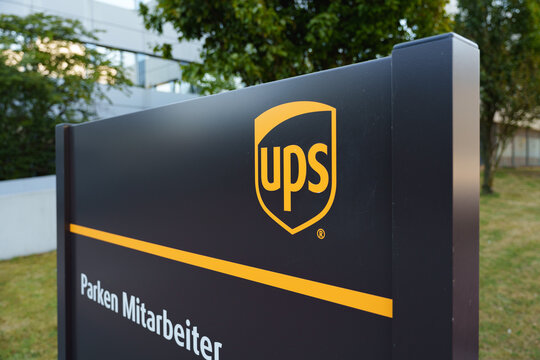 Logo of UPS, global shipping and logistics company at the entrance to the office branch