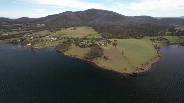 Panorama Of Forested Mountain And Fields From Blackman Bay In Tasmania, Australia. - aerial shot