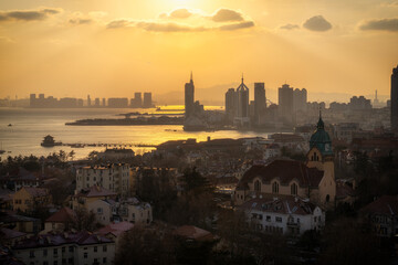 Qingdao, China: city skyline, architecture, landscape, city, metropolis, landmark, background, tourist destination, downtown, modern.